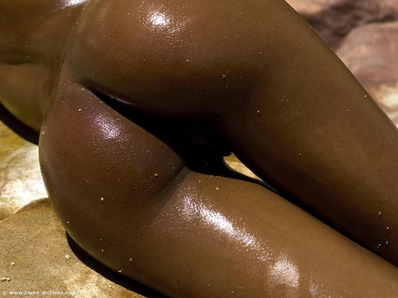 Naomi with her perfect ebony skin enjoys a little nude sun bathing on a hot summer day 12