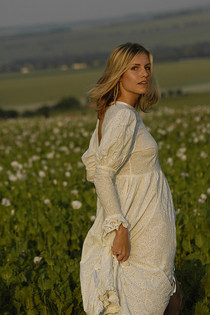 Petite blonde Iveta showing her amazing ass among flower-00