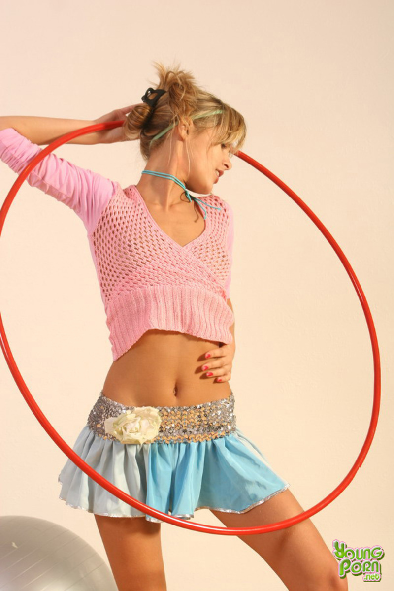 Tempting blonde teenie posing nude 10