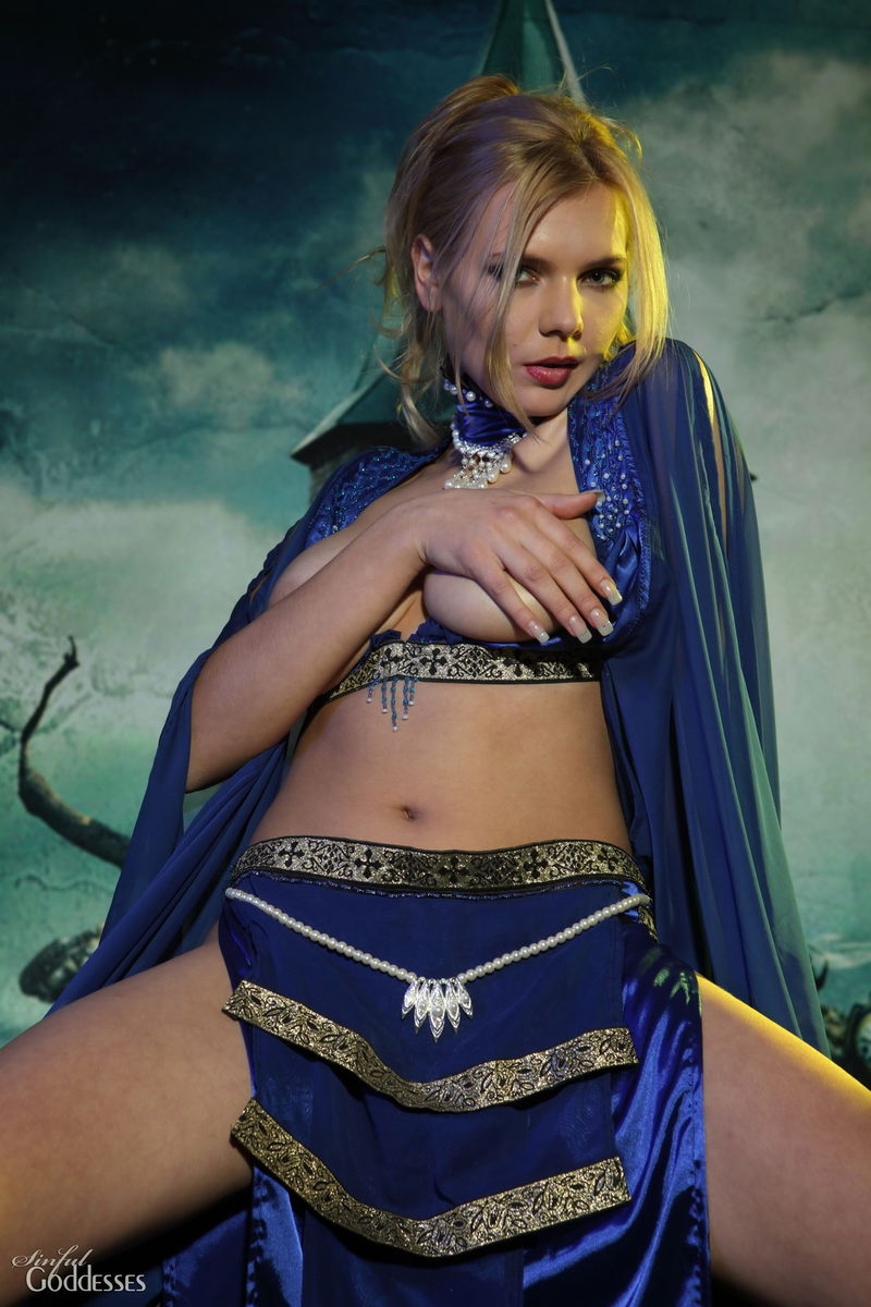 Hot witch is satisfying her shaved and lovely kitty 2