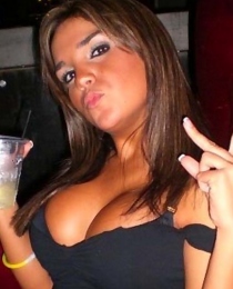 Party babe displays her huge tits